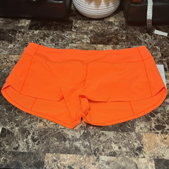 LULULEMON SPEED UP LOW RISE SHORT 2.5” SIZE 12 ORANGE COLOR NWT - Picture 3 of 6